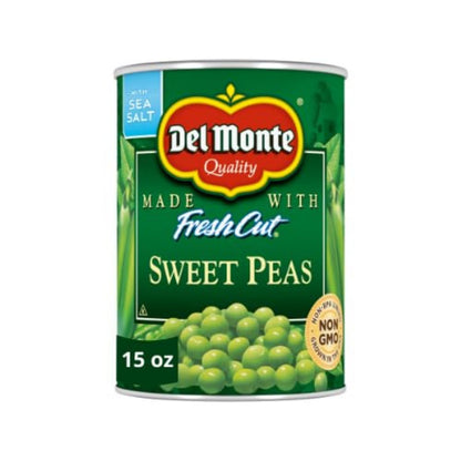 Canned Del Monte sweet peas in 15-ounce cans, fresh-cut green peas packed in a four-pack, ready for cooking or side dishes.