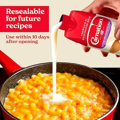 Carnation Lactose-Free Evaporated Milk 8-pack, creamy canned milk with lactose-free formula, ideal for dairy-free recipes.