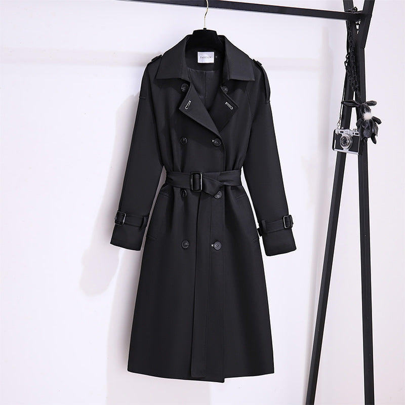 Elegant high-end mid-length women’s trench coat in a classic tailored design