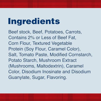 Canned Dinty Moore beef stew with potatoes and carrots in a 15oz can, showing the stew with chunks of beef, potatoes, and carrots.