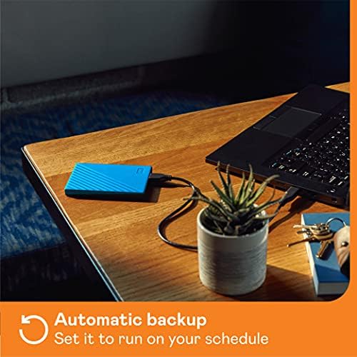 Western Digital 2TB My Passport portable external hard drive in blue with backup software, ransomware defense, and password protection.
