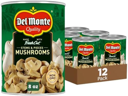 Canned Del Monte mushrooms stems and pieces in an 8 oz. can, shown stacked in a 12-pack, ready for cooking or food prep.