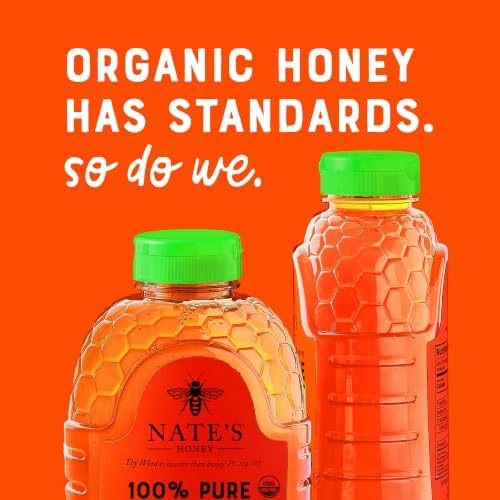 Nate's Organic Honey in a 16oz squeeze bottle, golden honey dripping from the nozzle, labeled as organic honey from Nate's Honey.