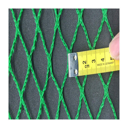 Green golf net displayed for practice and training