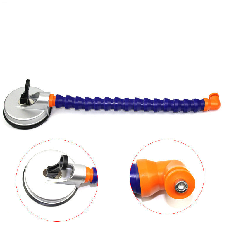 Dent repair tool for repairing vehicle body dents, shown with handle and pulling tip