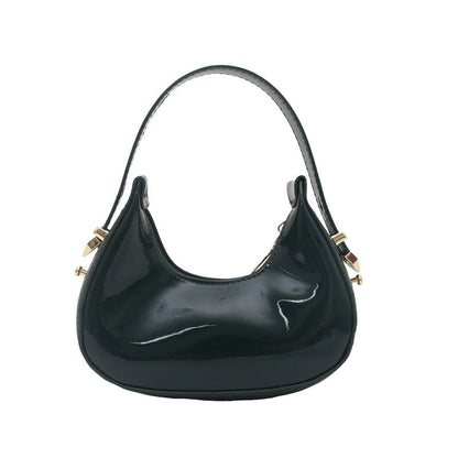 French-style niche luxury handbag in a refined design and compact silhouette