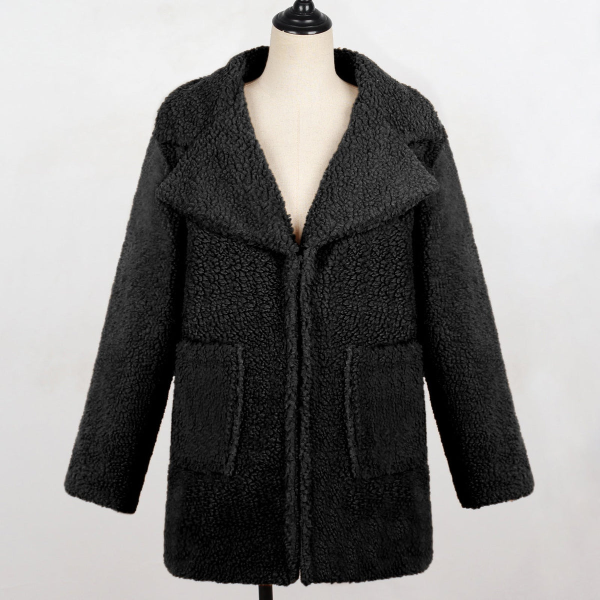 Long faux fur coat with suit collar for women, casual style in a full-length view
