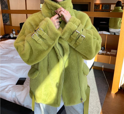 Women's leather fur coat with buckle front, full-length design and cozy collar