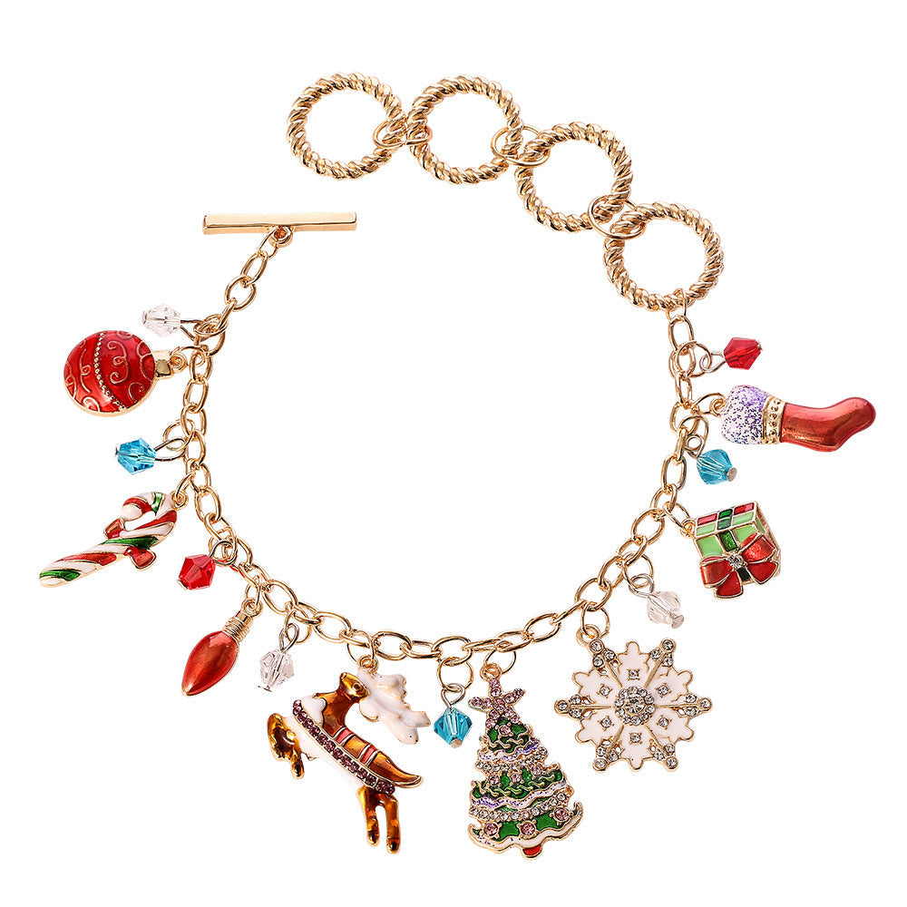 Halloween bracelet with festive orange and black beads and themed charms, close-up view