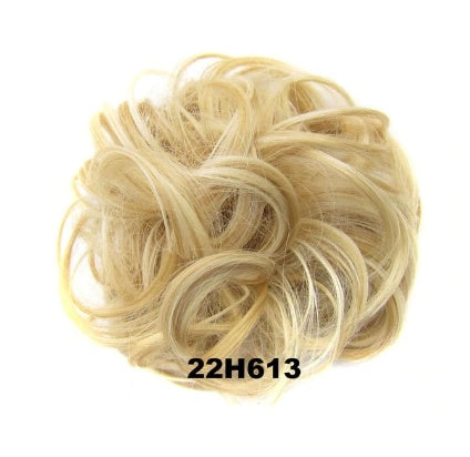 Hair ring accessory, close-up view of metallic ring design for styling hair