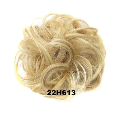 Hair ring accessory, close-up view of metallic ring design for styling hair