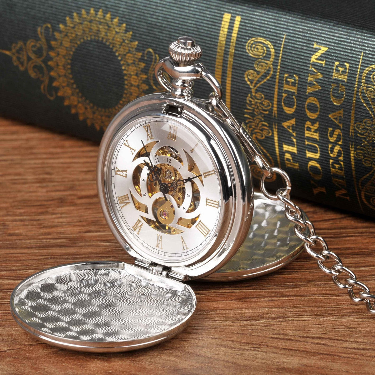 Large silver double-hinged mechanical pocket watch with visible cover and classic design