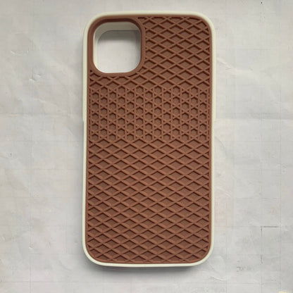 Waffle sole silicone phone case with textured tread-inspired design in orange
