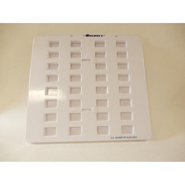 Dispill® medication blister tray with 32 cells, used for compliance packaging by Pasteur Pharmacy, medical supplies.