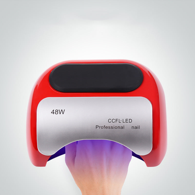 UV nail phototherapy machine with compact white design for curing gel polish and nail treatments