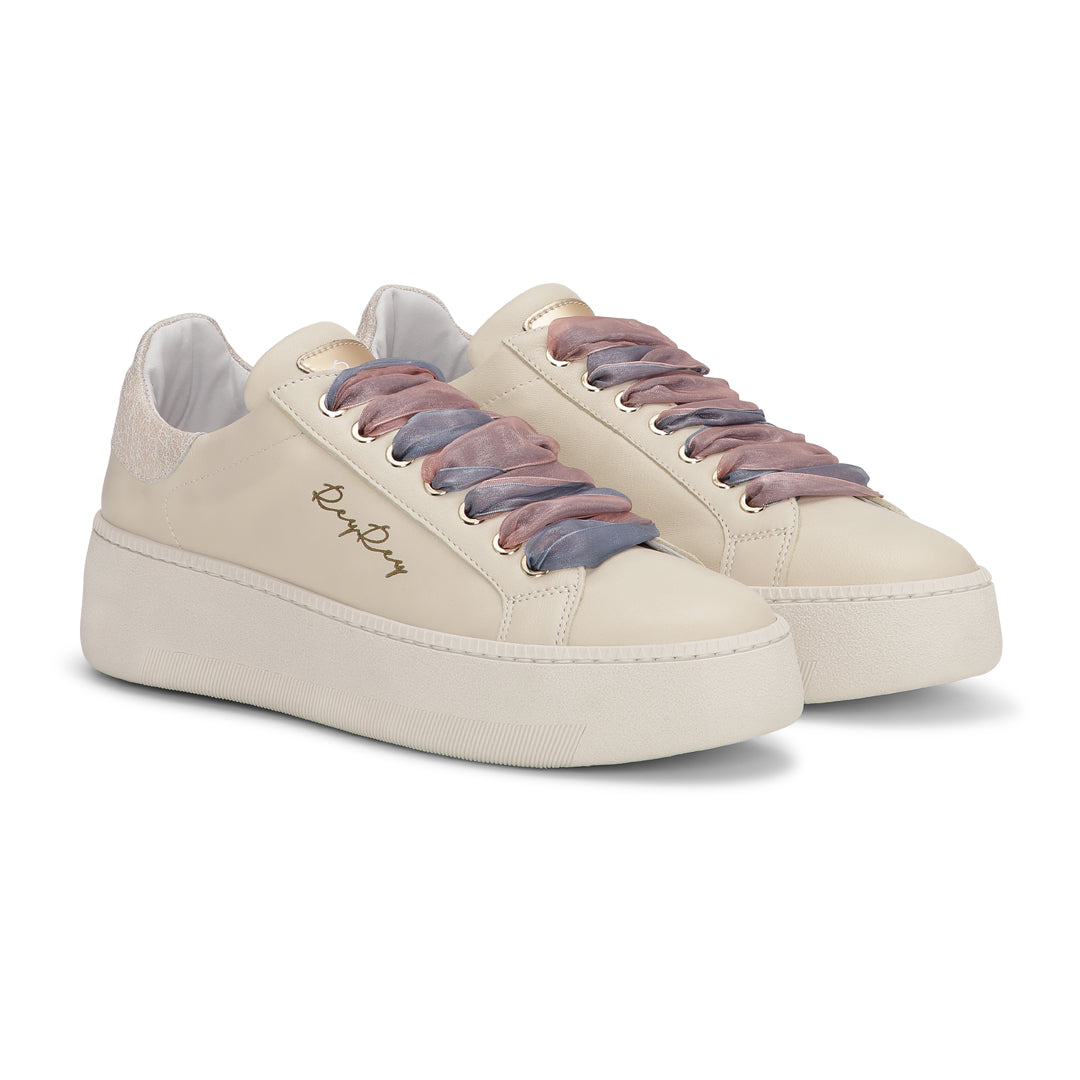 Beige ReyRey Special Edition sneakers with white soles and laces, showcasing stylish casual footwear.