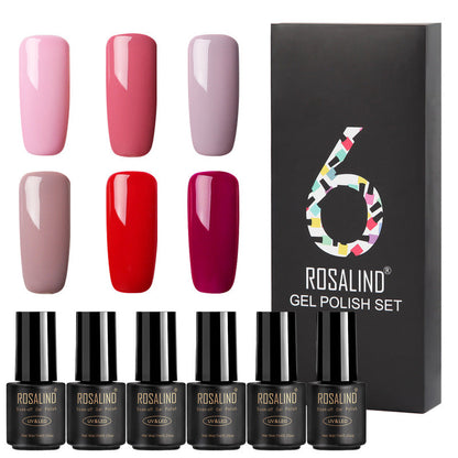 Six bottles of Fine nail polish in assorted colors displayed together