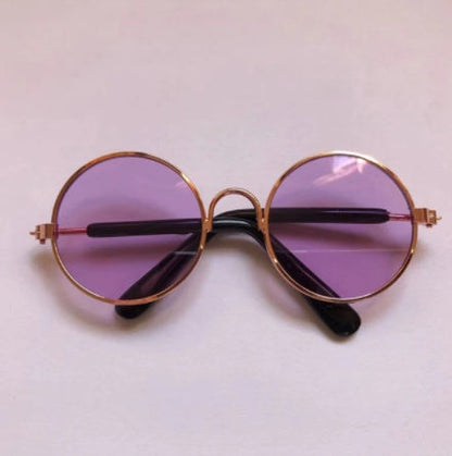 Cat wearing pet cat glasses and sunglasses, featuring a stylish frame for small pets