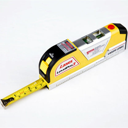 Simple plastic laser measuring level tool in green and black, featuring a visible laser beam and bubble vial