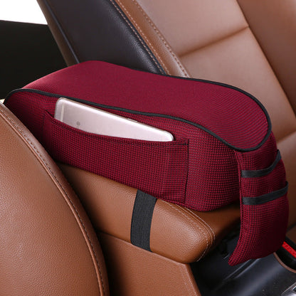 Car accessories armrest box pad in black, shown close-up for vehicle center console protection