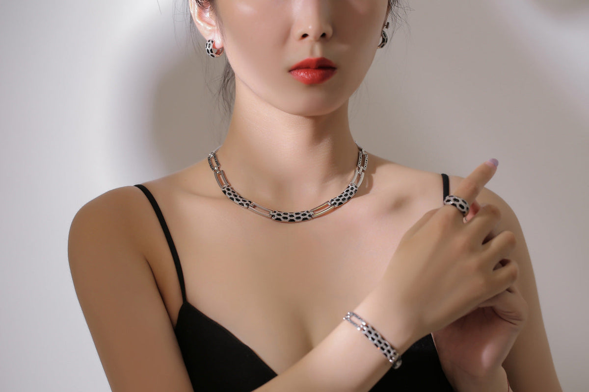 Korean-style diamond earring and necklace set in a coordinated jewelry design
