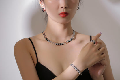 Korean-style diamond earring and necklace set in a coordinated jewelry design