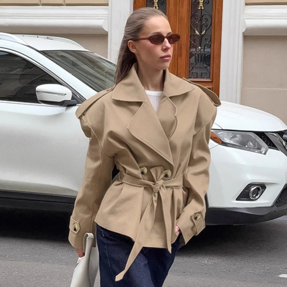 Women’s khaki mid-length lace-up trench coat with a waist-tight silhouette and casual style
