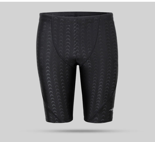 Shark skin five points men's swimming trunks, close-up view of textured swimwear design
