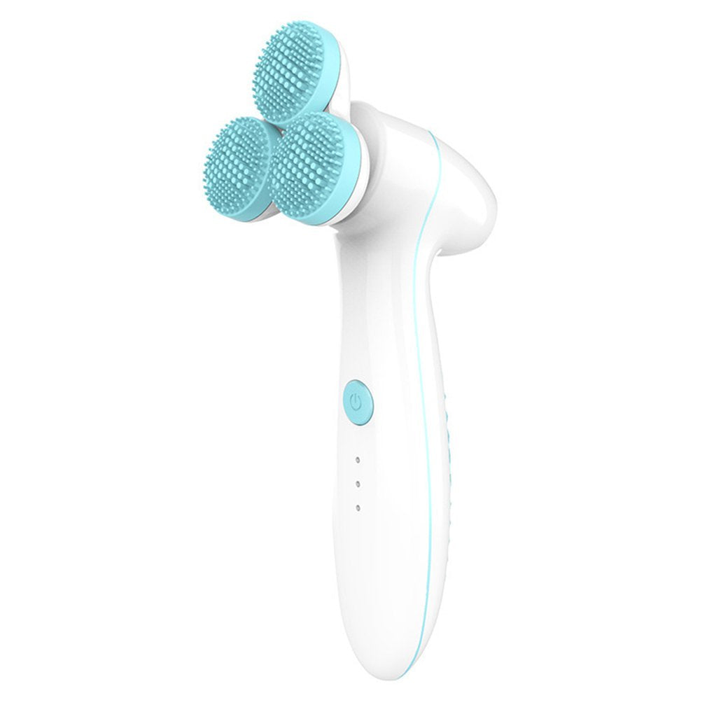 Three round 3D silicone facial cleansing instruments in pink, blue, and yellow hues