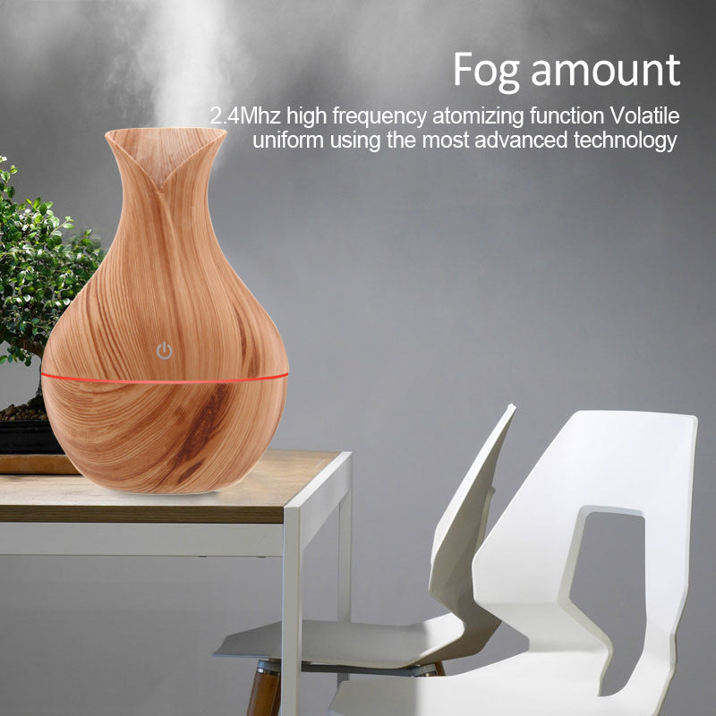 Vase-style humidifier in a decorative design, shown from the front