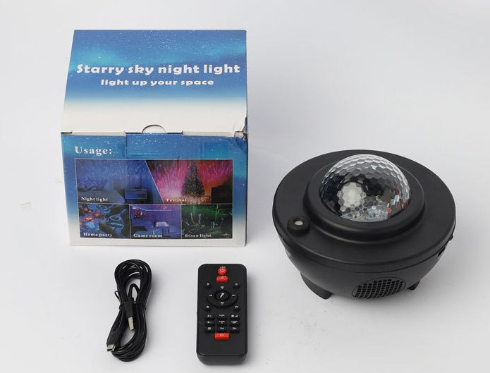 LED Bluetooth music projector light displaying colorful lights on a wall