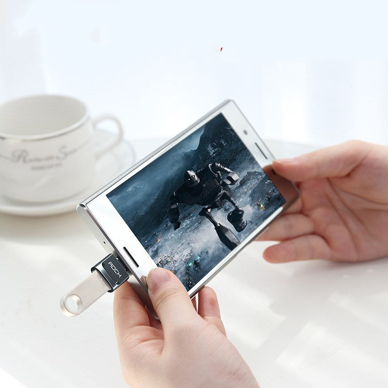 USB-C to Lightning charger adapter in white, compact design for charging compatible devices