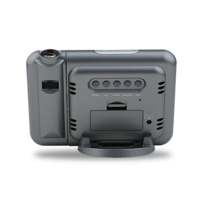 Black digital projection alarm clock with illuminated time display and compact rectangular design