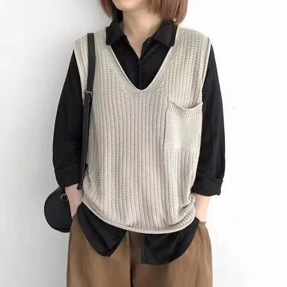 Simple V-neck artistic knit vest in a textured design, front view