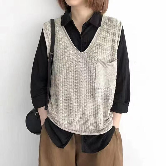 Simple V-neck artistic knit vest in a textured design, front view