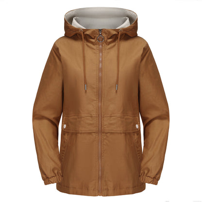Hooded solid color trench coat for women with long sleeves and a structured silhouette