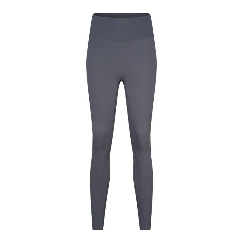 Women’s high-waisted butt-lifting yoga pants with seamless design, shown in black from the back