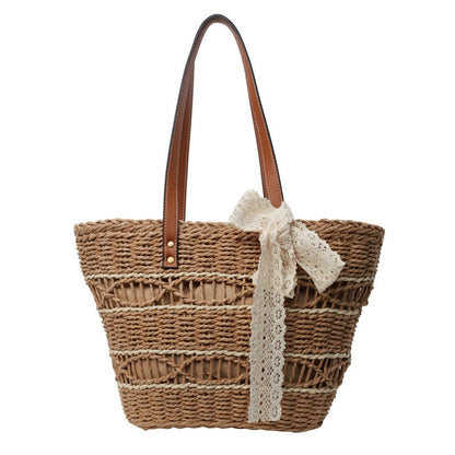 Women's large-capacity stylish woven tote bag for vacation in a natural woven texture