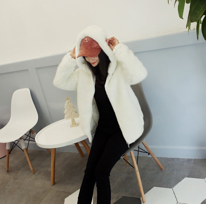 Women's faux fur mink coat in a soft, plush design