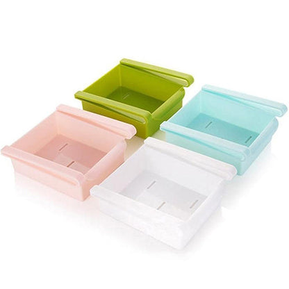 Hanging plastic refrigerator clapboard storage rack for organizing kitchen supplies, front view