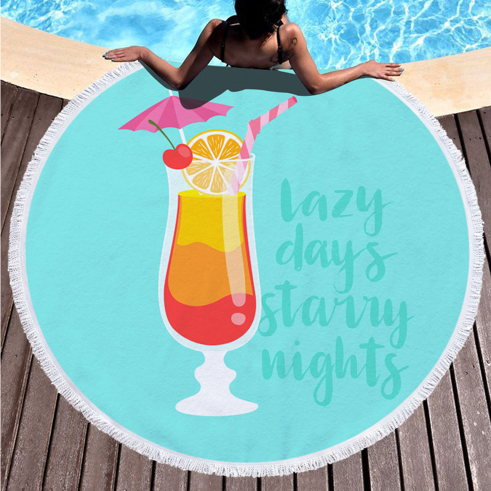 Round digital printing beach towel with colorful printed design laid flat