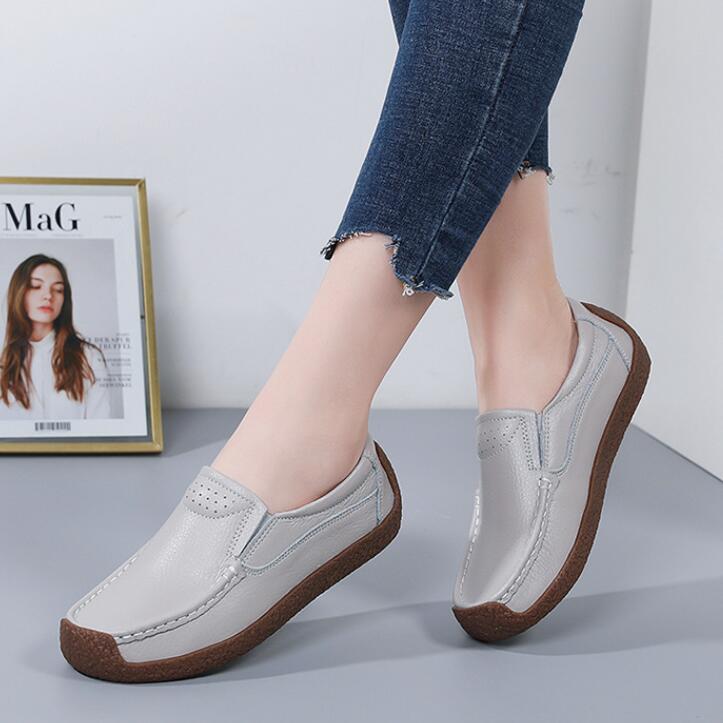 Women's cowhide leather Oxford flats by BACKUPMYFILESNOW® with rounded toe and classic lace-up design.
