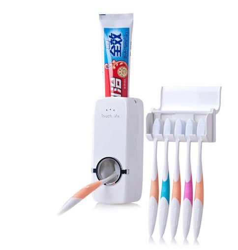 Automatic toothpaste squeezer wall-mounted dispenser in white plastic, front view