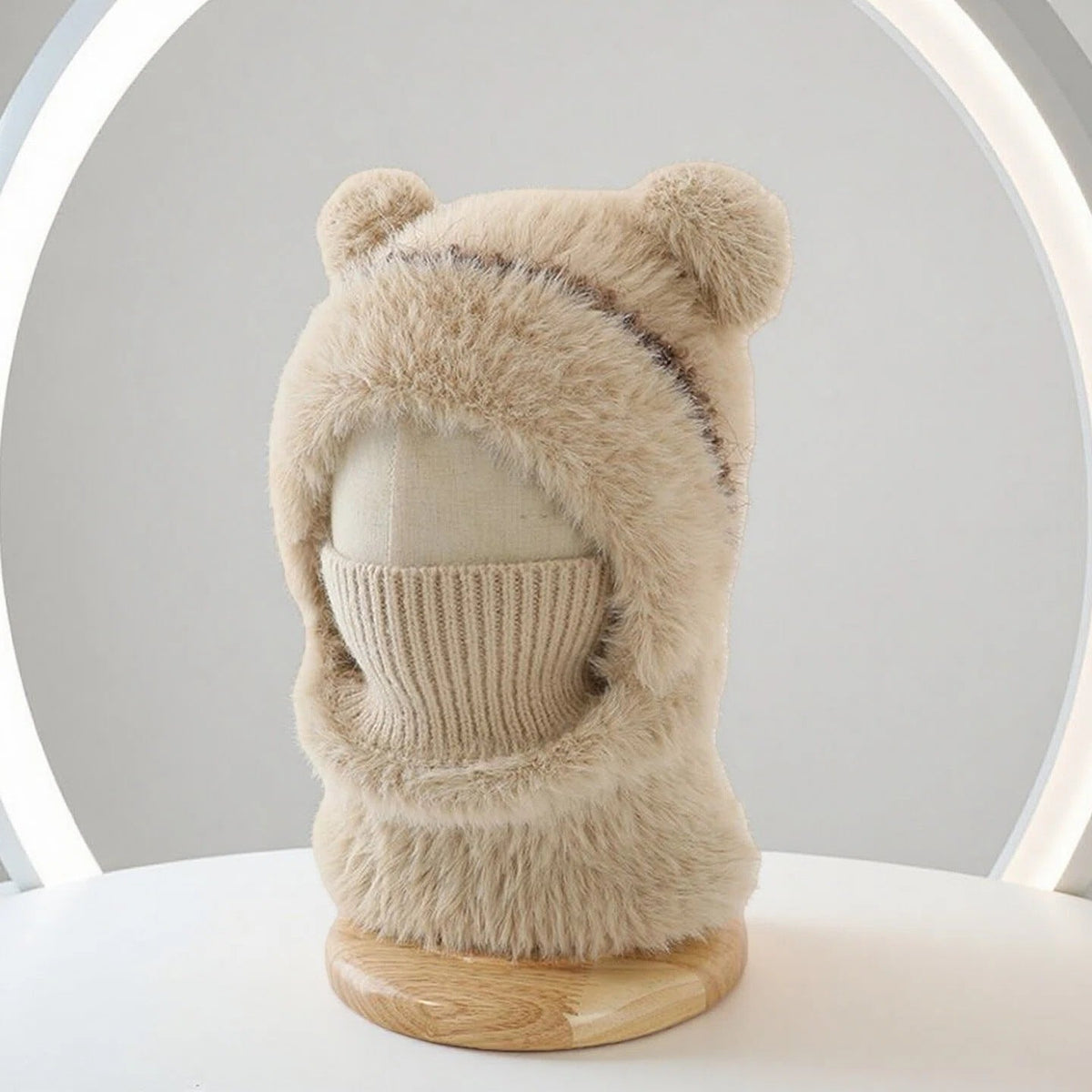 Warm windproof knitted wool hat with earflaps in a cozy winter design