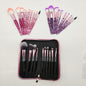 10-piece essential makeup brush kit from BACKUPMYFILESNOW® with various brushes arranged on a neutral background.