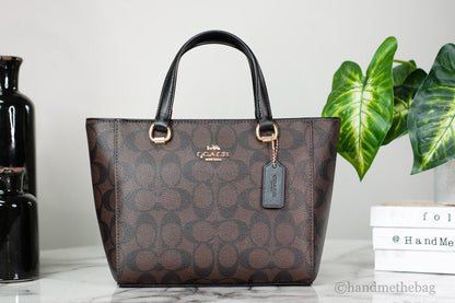 Coach CA613 Alice small brown and black crossgrain leather satchel crossbody bag with convertible strap, stylish and compact.