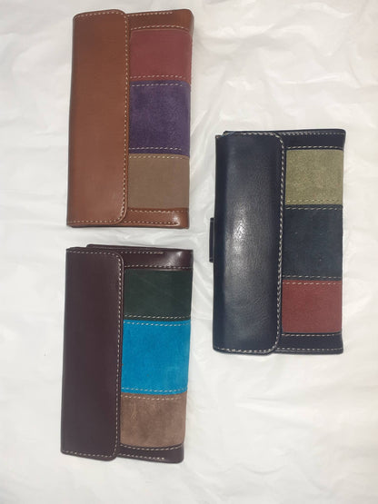 Handmade women's wallet with multiple card slots and a sleek leather design, perfect for everyday use.