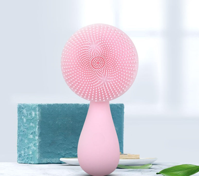 Multifunctional face brush with soft bristles for cleansing and exfoliating skin
