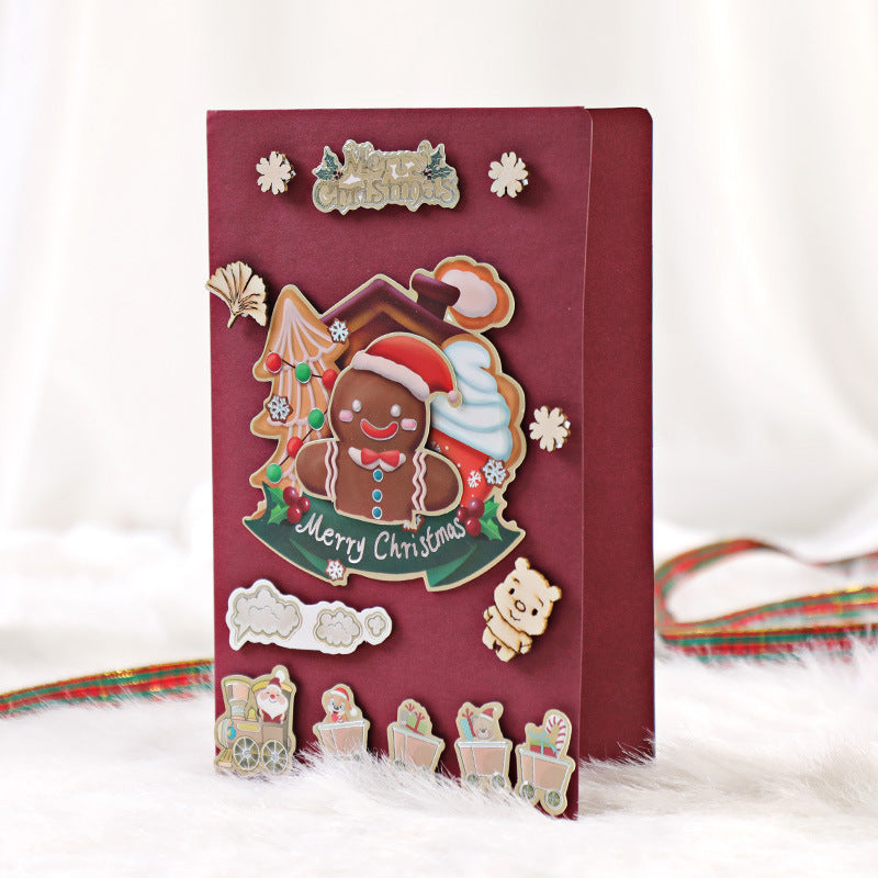 DIY Christmas greeting card with cute cartoon design and handmade message space