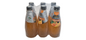 Six-pack of Nut Fusion Leonard Basil Drinks in various natural flavors, showcasing colorful bottles on a white background.